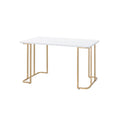 Bureau rectangulaire blanc et or avec piètement ouvert en métal